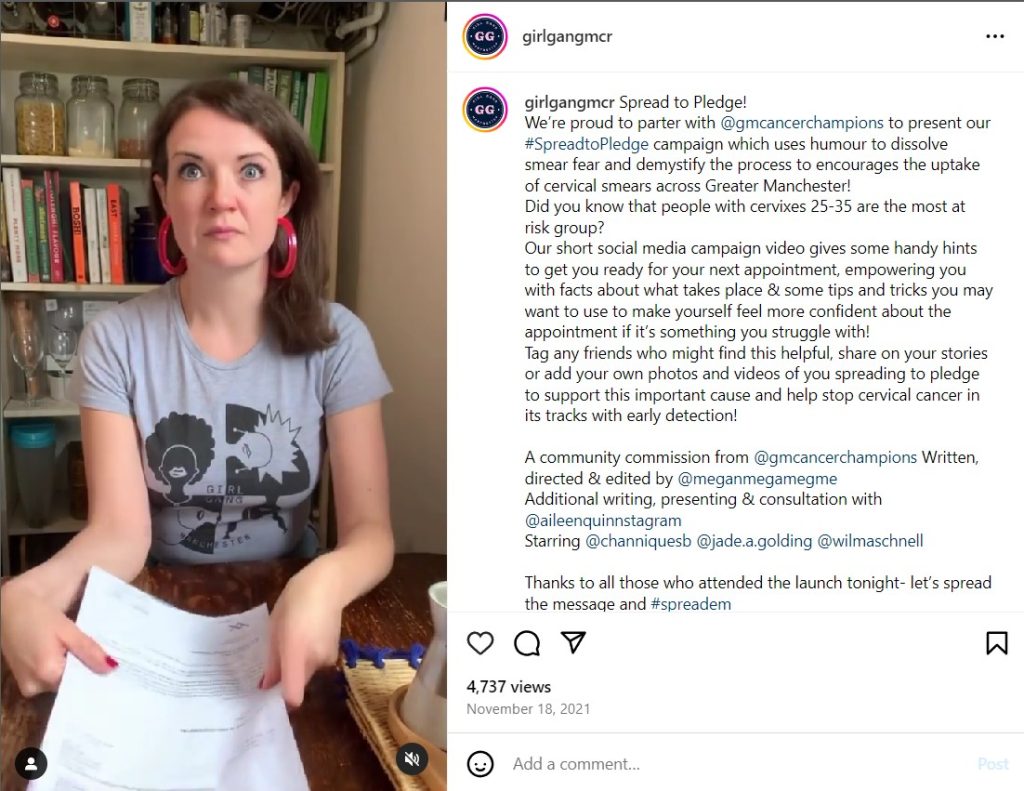 screenshot of an instagram post of a woman sat at a table holding papers looking shocked